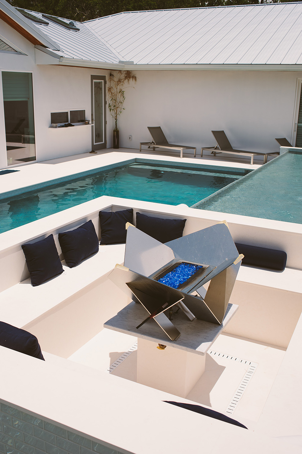 Design your luxury pool area with thoughtfully placed seating areas